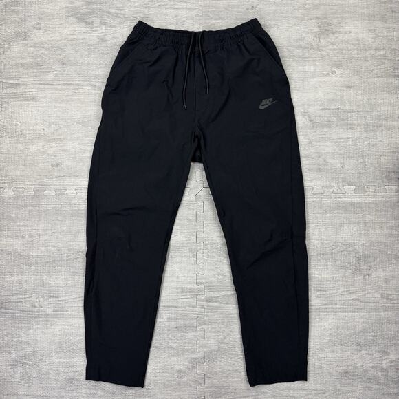 Nike Sportswear Commuter Pants Mens Large Black Tech Woven Performance DM6621 - Picture 1 of 10